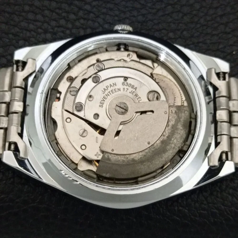 Vintage 1976 Seiko Automatic Mens Silver Watch W/daydate & Black accents